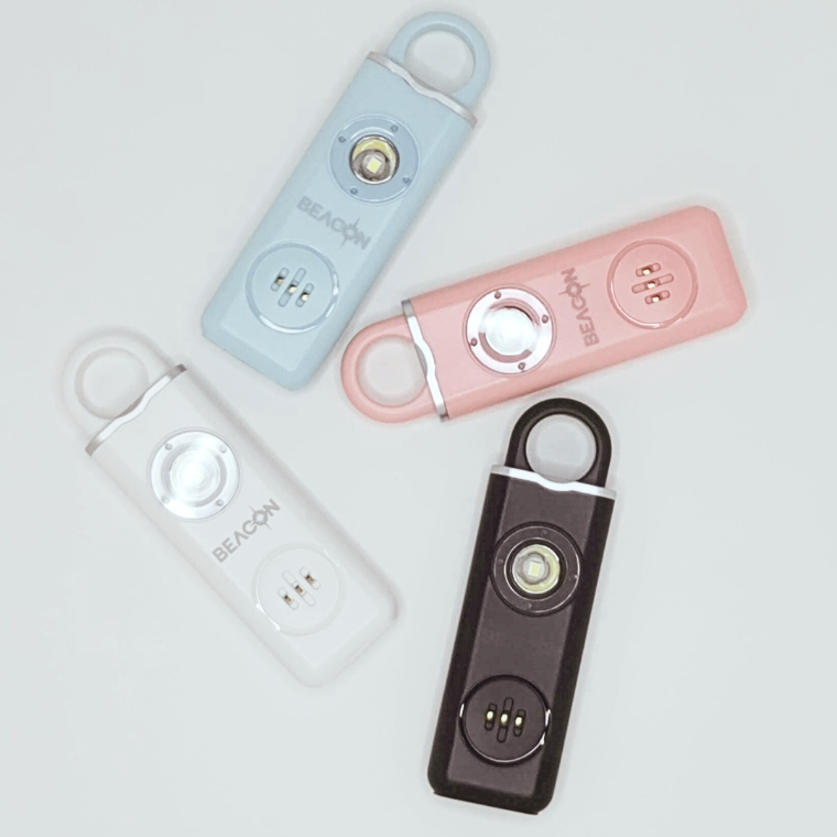 Four Beacon Personal Alarms in available colours: White, Black, Pink and Blue