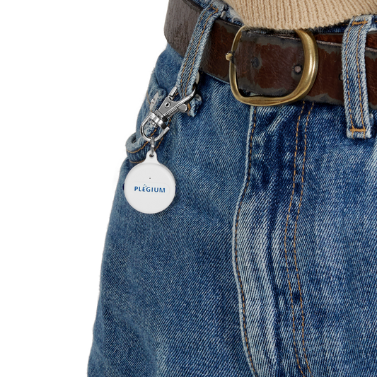 Image of Plegium Smart Button attached to Jeans trousers